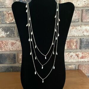 Gold and cream iridescent beaded 72” gold tone necklace